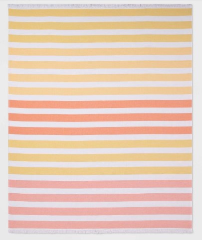 Orange red and pink striped oversized beach towel.